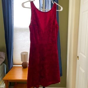 Red velvety dress with V back.